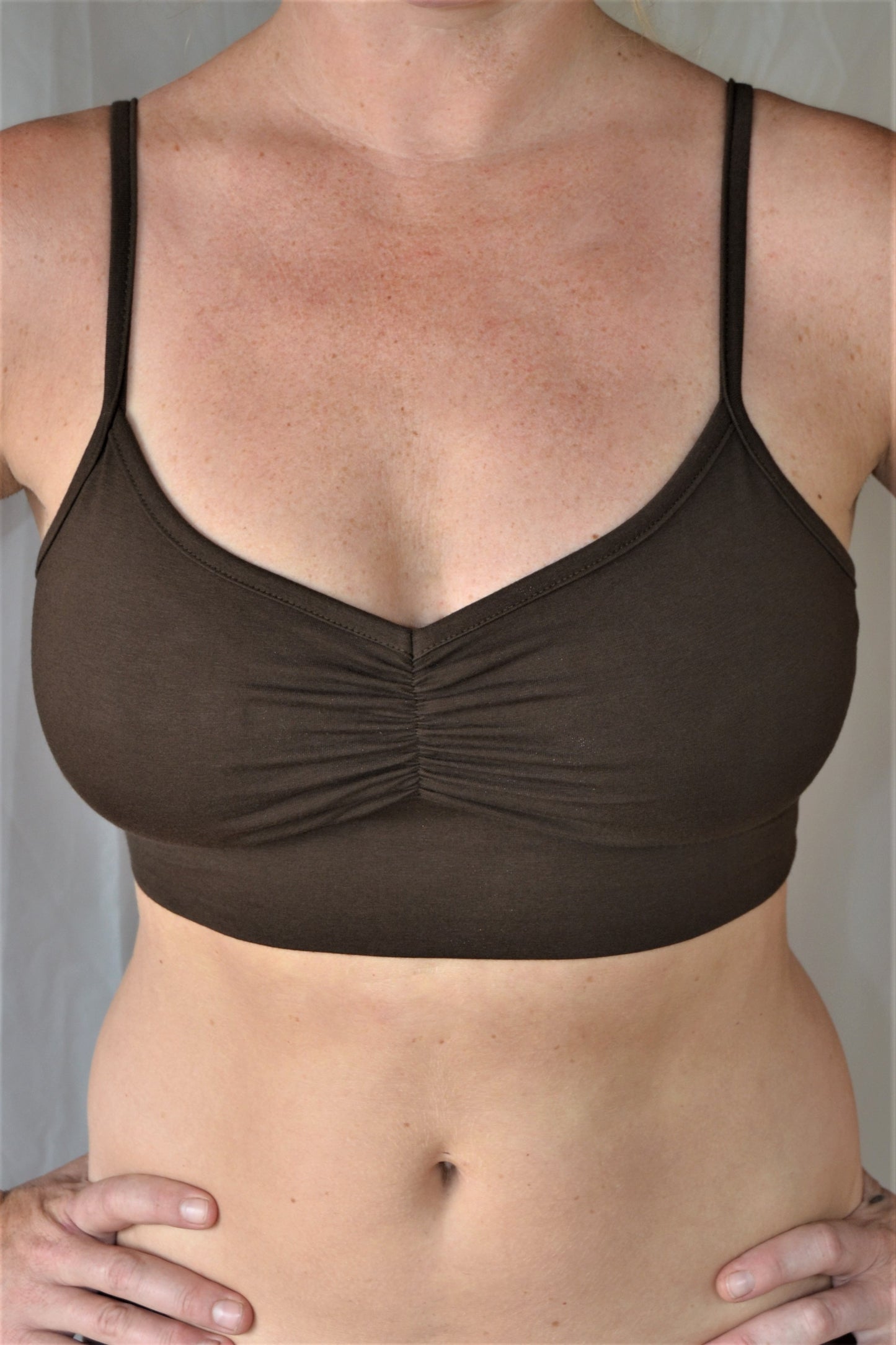 You'll be blissed out in this flattering Chocolate (brown) bra with adjustable spaghetti straps and scrunched center puckering it will soon become your new favorite!