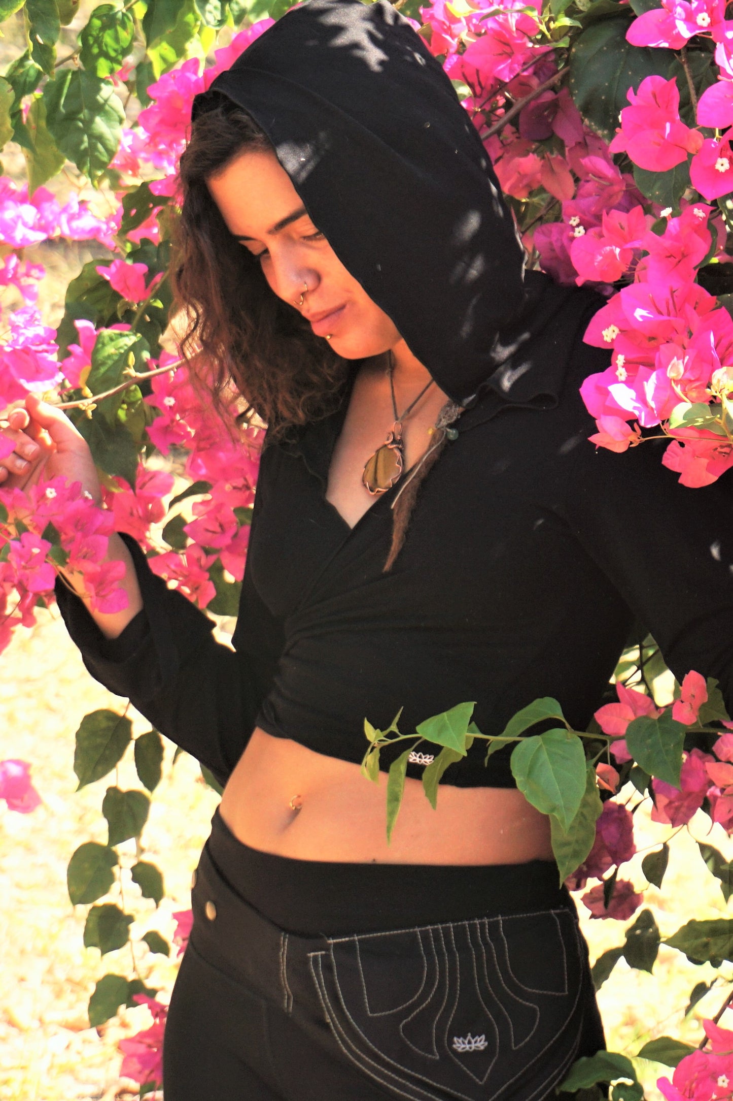 Hoody top that can be worn as a jacket or a shirt. Wraps around back for custom fit. Silky and stretchy yoga lifestyle wear.