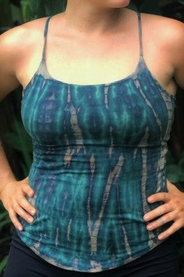 Rainforest tie dye tank top has spaghetti straps and rounded botton in the front. Flattering lace up back makes adjustable fit.