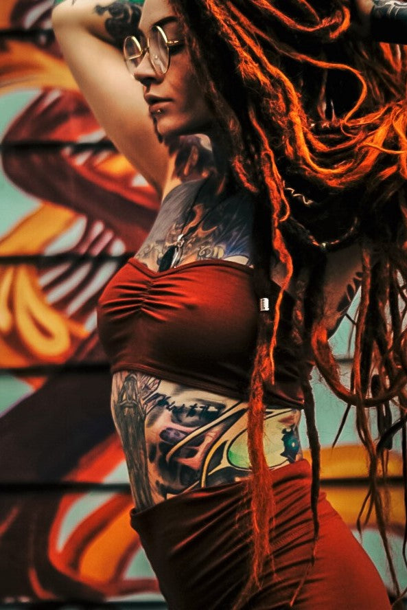 Side view of Rust Bandeau Bra Top with matching shorts. Center ruching between breasts makes it flattering.