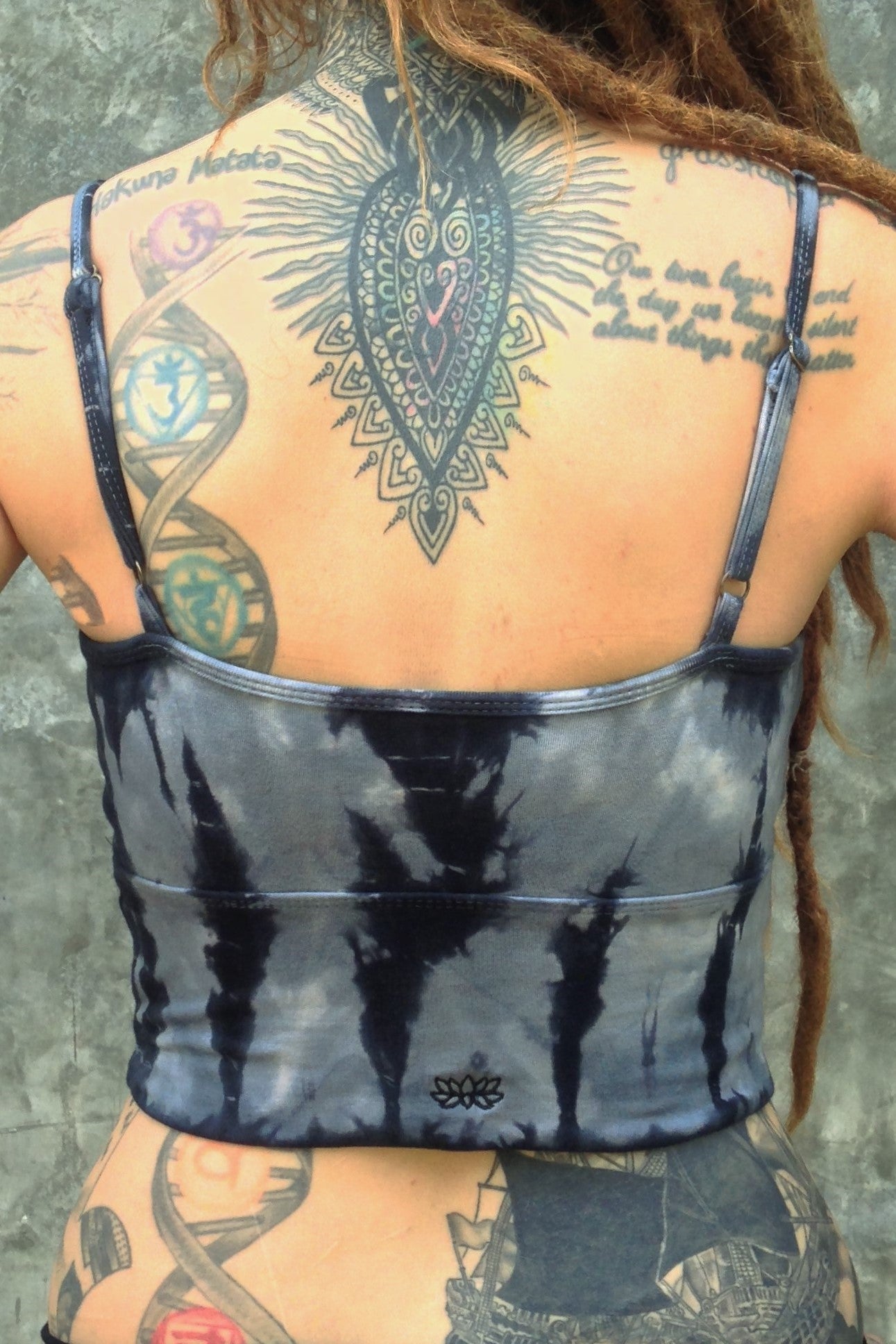 Back view of Sodalite tie dye Blissed Out crop tank with spaghetti straps and small Lotus Flower embroidery. 90% Organic cottong with 10% spandex.
