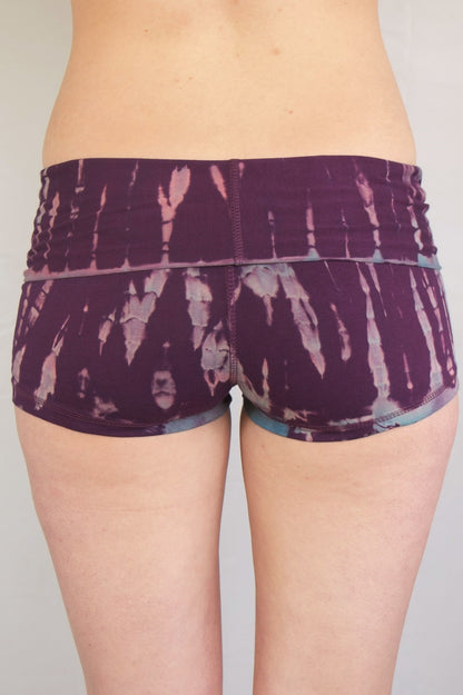 Purple tie dye yoga shorts lighter lavender/blue streaks. Fold top waist. 