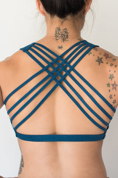 Back view shows 4 criss cross straps of Cobalt Blue Sports Bra...Soft, comfortable and super cute with enough support for yoga, gym, cross fit, running, or whatever fitness you enjoy, without the girls falling out.