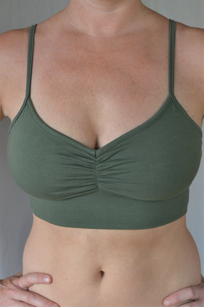 You'll be blissed out in this flattering Sage green bra with adjustable spaghetti straps and scrunched center puckering, it will soon become your new favorite!