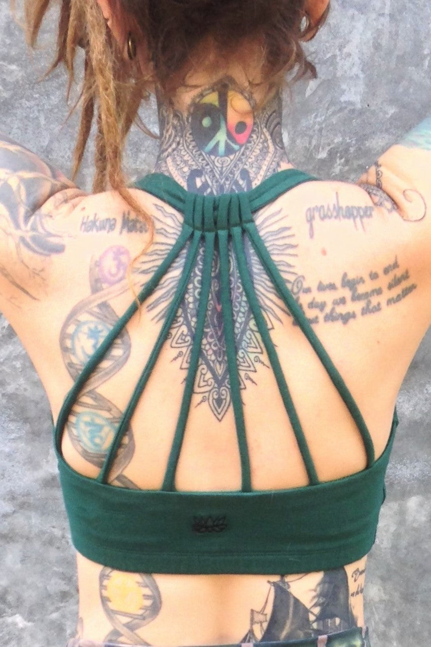 Back view of Shakti Shortsbra with 6 back straps going up vertically and meeting at the base of the neck. Shows small black lotus flower embroidery.