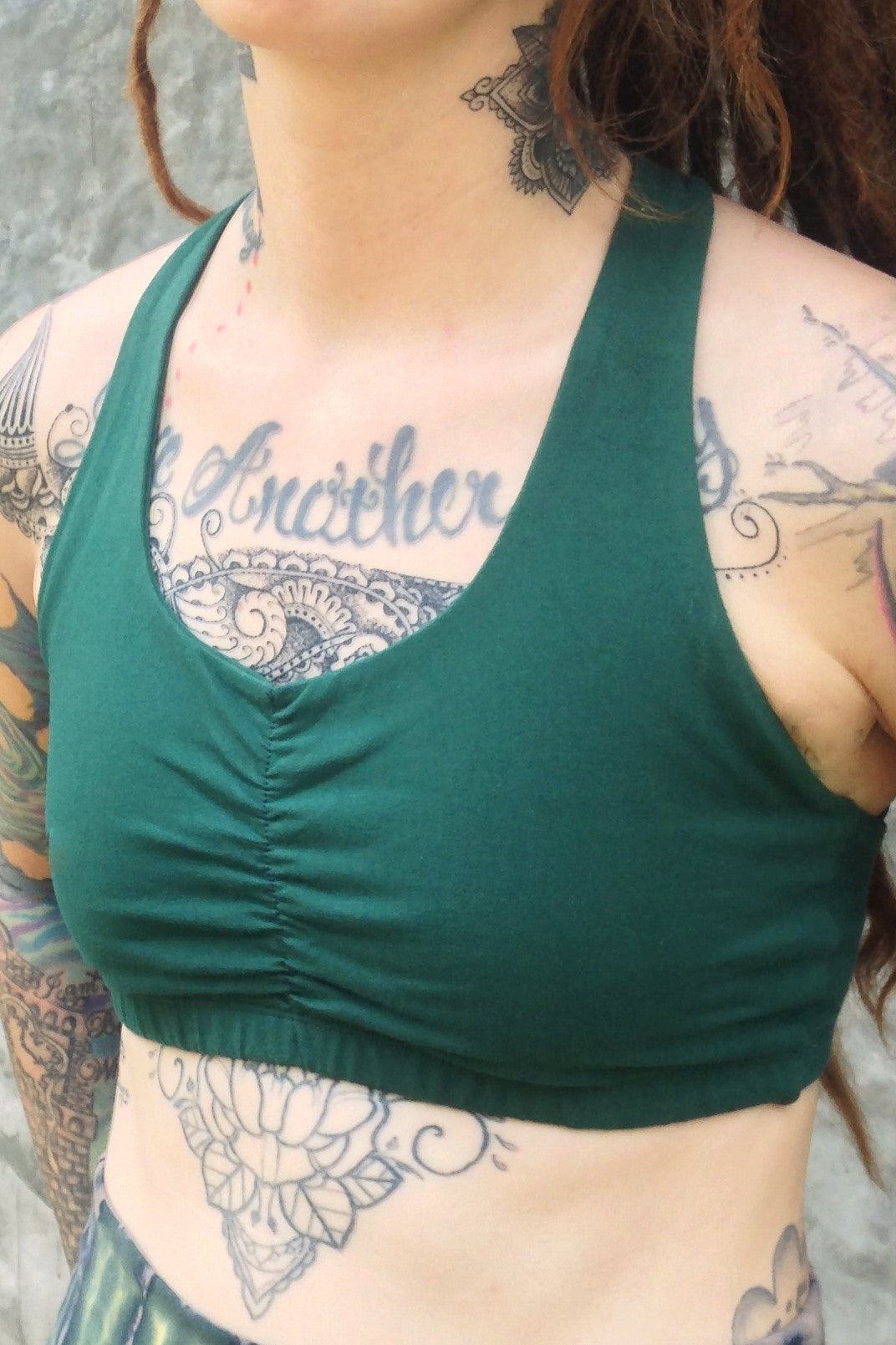 Side view of organic cotton Shakti Sportsbra with scrunching between the breast. 