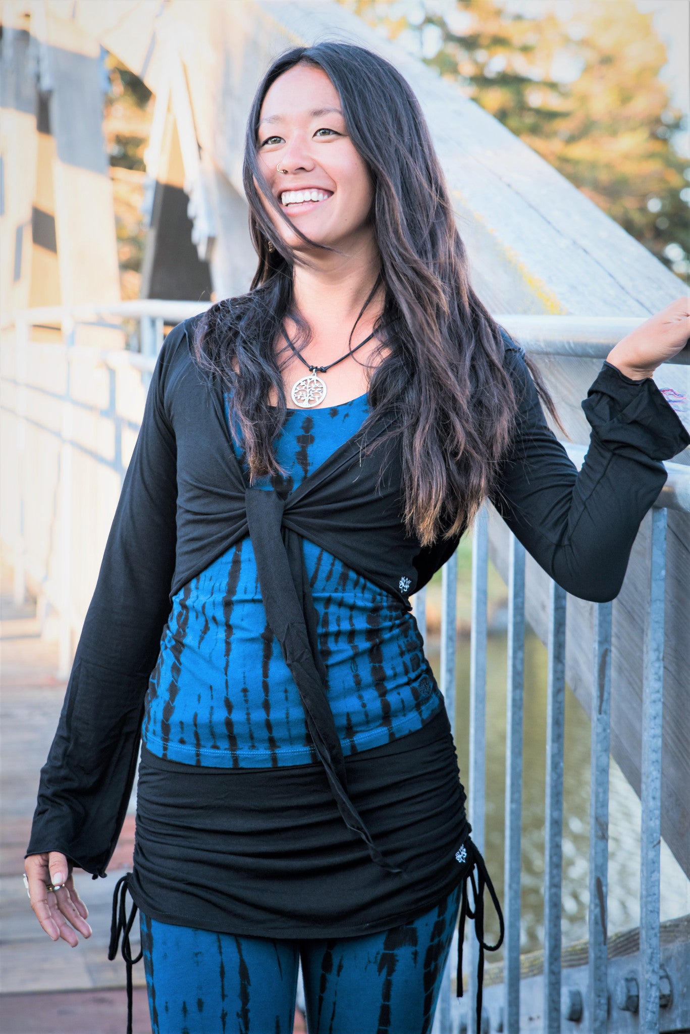 Long Sleeve Onyx Ninja Jacket Wraps come with oversized hood and see thru detail on back. Soft and silky, perfect for layering over a sportbra after yoga class or as streetwear 