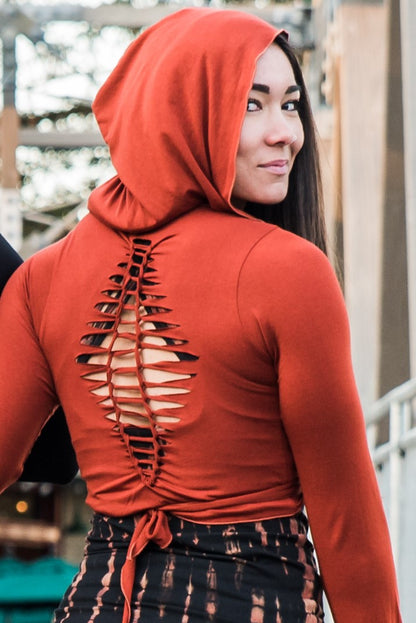 Long Sleeve Rust Ninja Jacket Wraps come with oversized hood and see thru detail on back. Soft and silky, perfect for layering over a sportbra after yoga class or as streetwear 