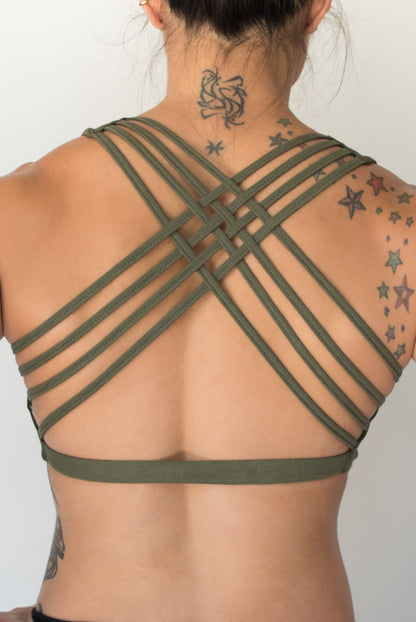 Sage sports bra with 4 criss cross straps on back with enough support for down dog and other yoga poses, or whatever sports you enjoy. 90% cotton 10% spandex 