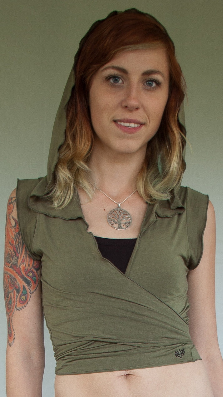 Sage Sleeveless Ninja Wraps come with oversized hood and see thru detail on back. Soft and silky, perfect for layering over a sportbra after yoga class or as streetwear.