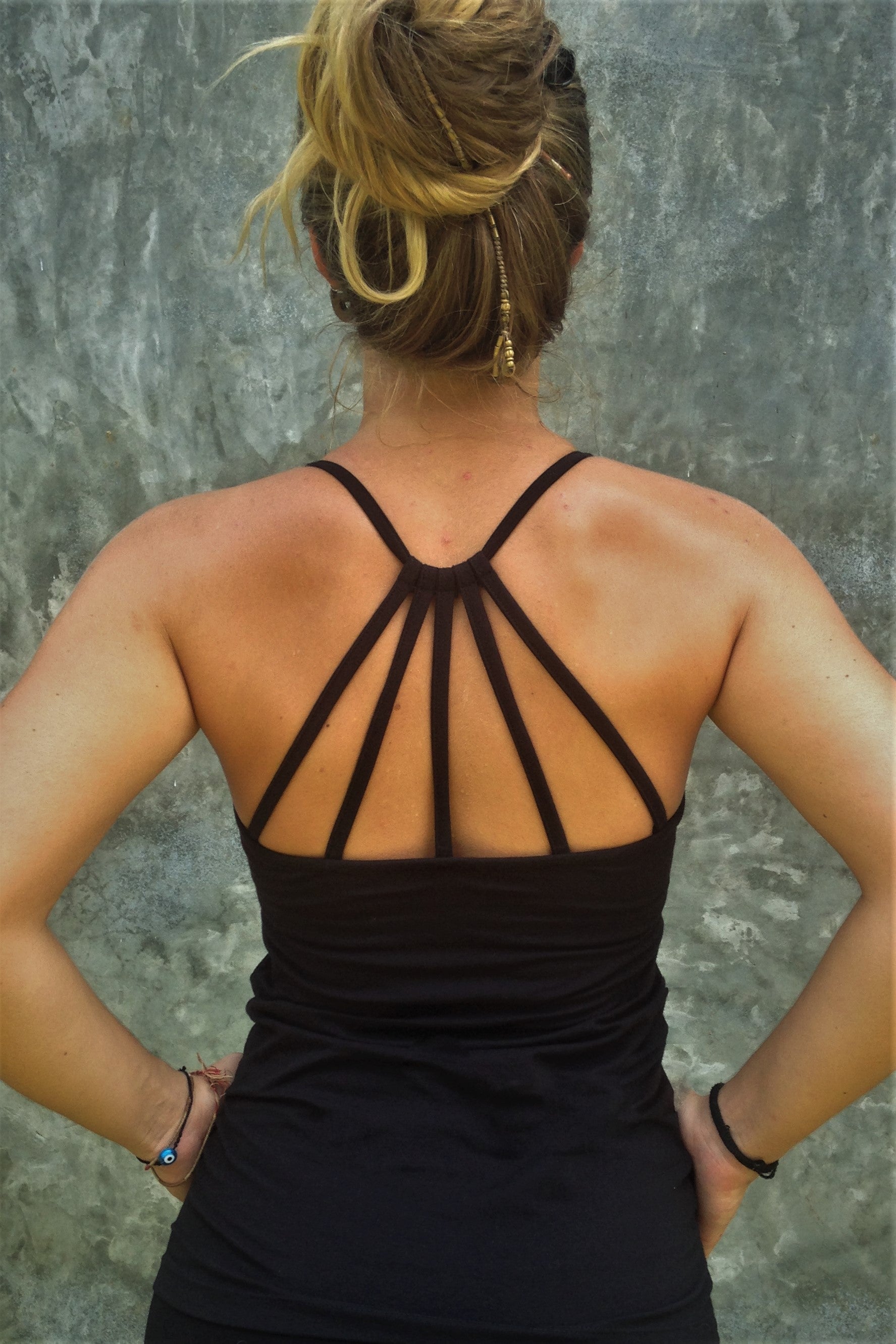Back view of black Onyx Tank Top with beautiful back strap design.