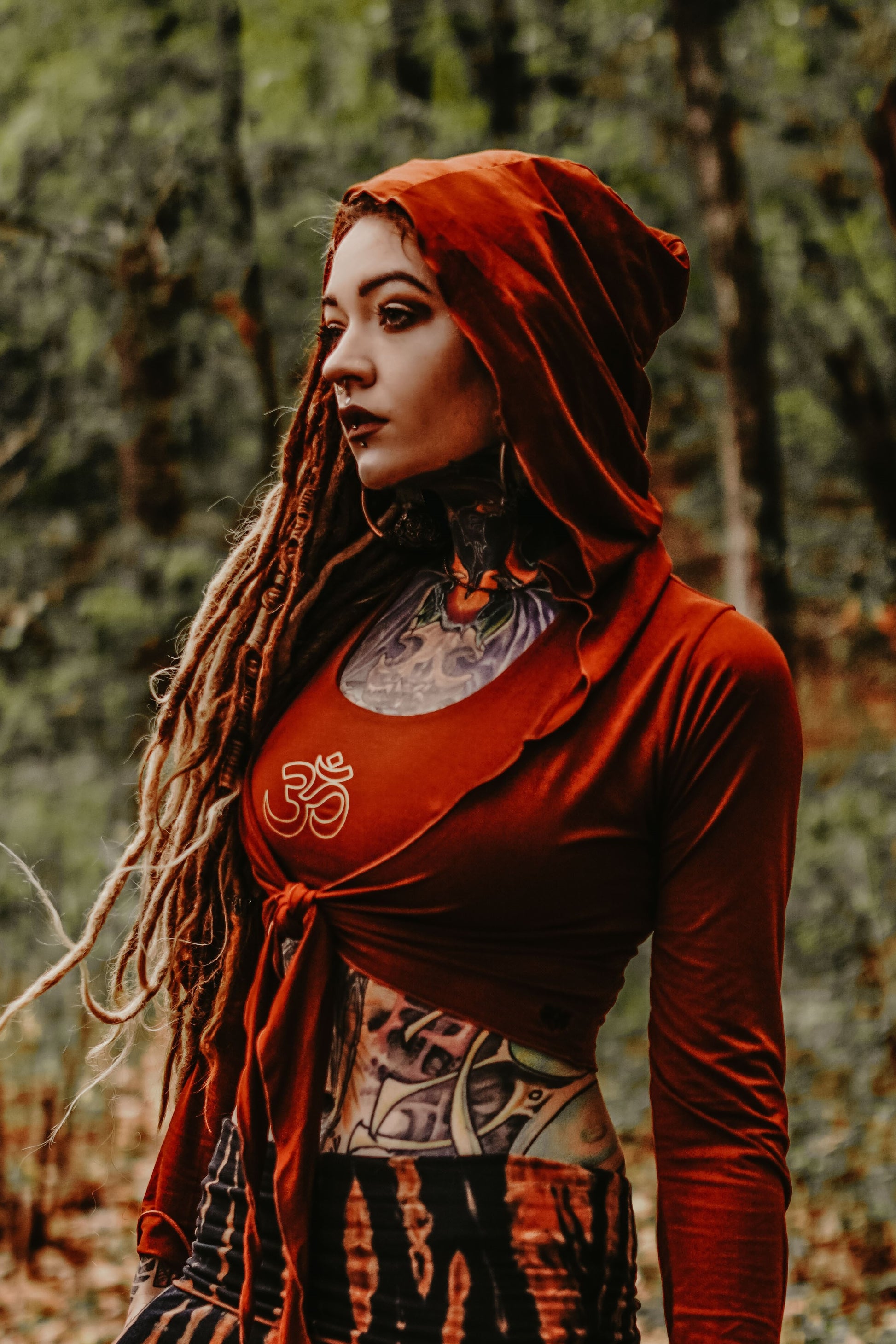 Long Sleeve Rust Ninja Jacket Wraps come with oversized hood and see thru detail on back. Soft and silky, perfect for layering over a sportbra after yoga class or as streetwear 